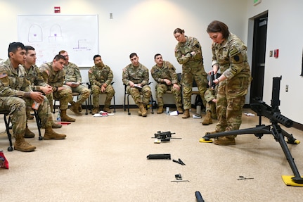 U.S. Soldiers with the Pennsylvania National Guard engage in hands-on learning in the classroom portion the crew served weapons course at Fort Indiantown Gap, Pennsylvania, Jan. 26, 2024. The crew served weapons course is offered through the Pennsylvania National Guard's Individual Training Branch. 28 students from units across the state honed their marksmanship skills by training on the M249 light machine gun, M240B machine gun, Mark 19 40 mm grenade machine gun and M2A1 machine gun to become subject matter experts on those weapon systems. (U.S. Army National Guard photo by Sgt. 1st Class Zane Craig)