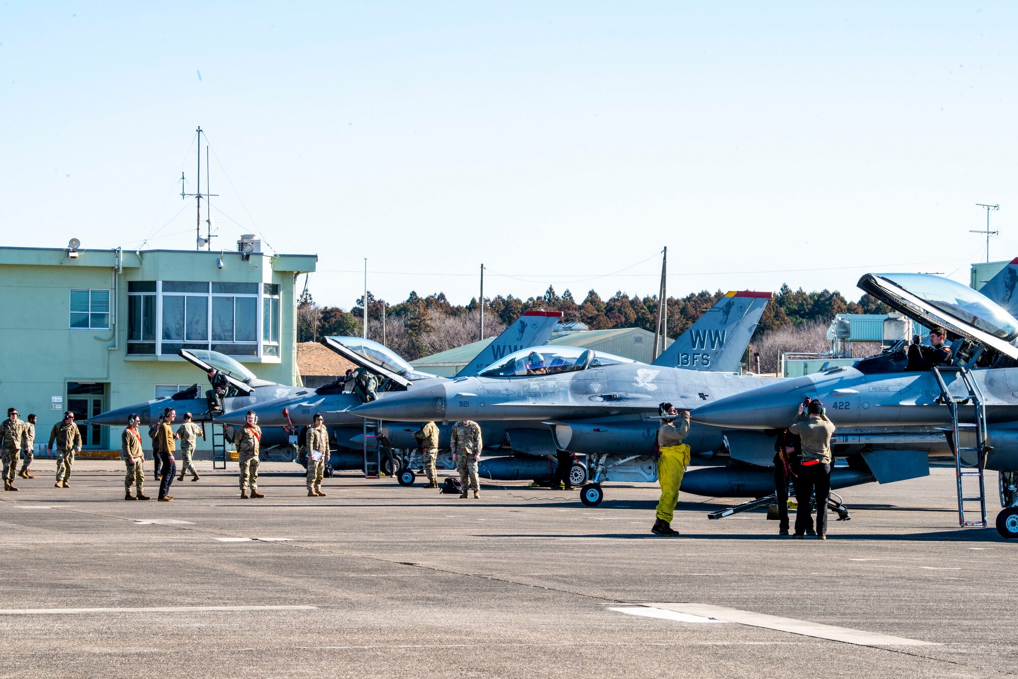 U.S. Air Force Airmen from the 35th Fighter Wing perform post-flight checks after arriving at Hyakuri Air Base, Japan, Jan. 26, 2024.