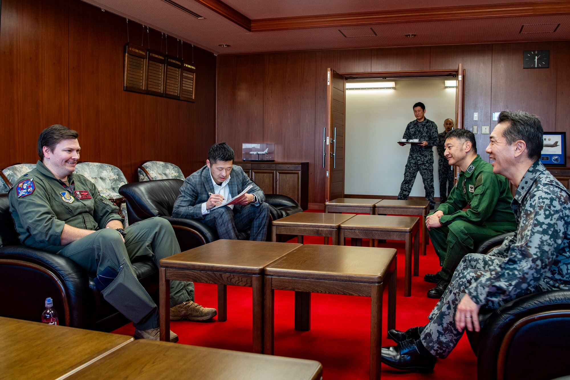 U.S. Air Force Lt. Col. Keegan Dale, 13th Fighter Squadron commander, meets with Japan Air Self-Defense Force Maj. Gen. Tomohiro Matsuura, 7th Air Wing commander during the Aviation Training Relocation exercise at Hyakuri Air Base, Japan, Jan. 30, 2024.