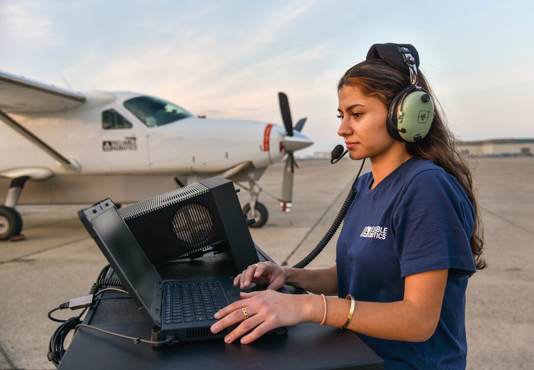 Danah Tommalieh, Reliable Robotics commercial pilot and engineer, monitors an autonomous flight from a control station during AGILE-FLAG 24-1 at McClellan Airfield in Sacramento, California, Jan. 30, 2024.
