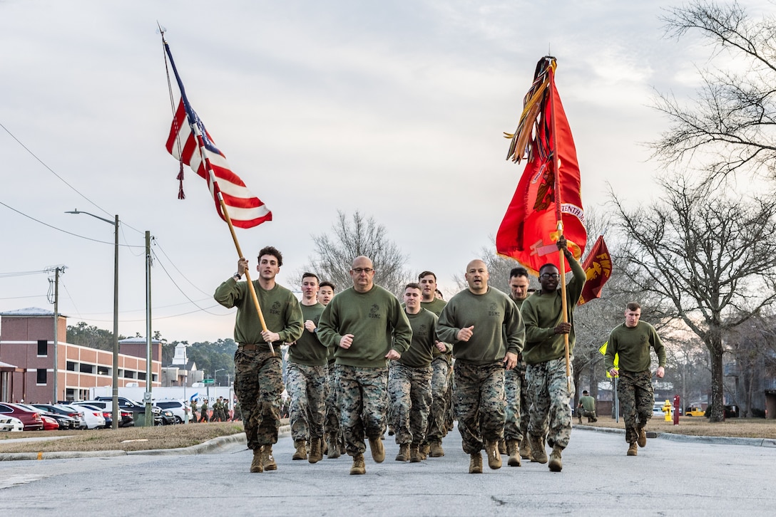 U.S. Marines with 10th Marine Regiment, 2d Marine Division participate in a motivational run before the King’s Games field meet at Camp Lejeune, North Carolina, on Feb. 2, 2024. King’s Games is an annual event where Marines from 10th Marines compete in various competitions to strengthen the unit’s esprit de corps and honor the patron saint of field artillery, Saint Barbara. (U.S. Marine Corps photo by Lance Cpl. Eric Dmochowski)