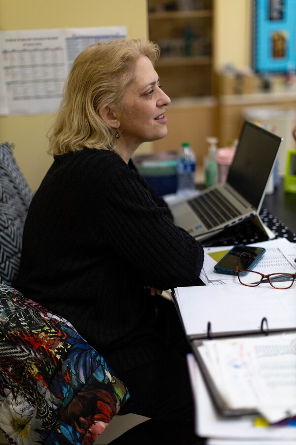 Nicole Colburn, a Department of Defense Education Activity (DoDEA) art teacher at Iwakuni Intermediate School, looks around her classroom at Marine Corps Air Station Iwakuni, Japan, Jan. 12, 2024. A native of Shirley, Massachusetts, Colburn teaches art as a way to follow her passion for the history, culture, and creativity of art.(U.S. Marine Corps Photo by Cpl. Peter Rawlins)