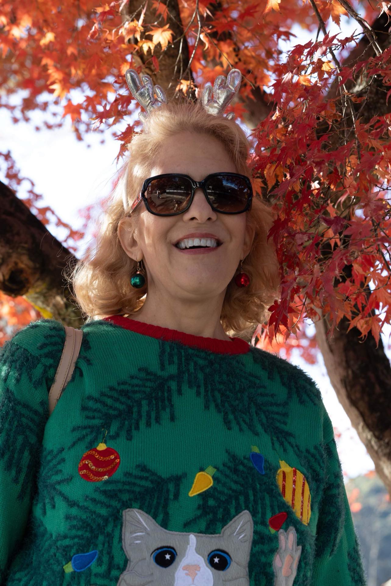 Nicole Colburn,  an art teacher for Department of Defense Education Activity (DoDEA) at Iwakuni Intermediate School, poses for a picture. (U.S. Marine Corps Courtesy Photo)