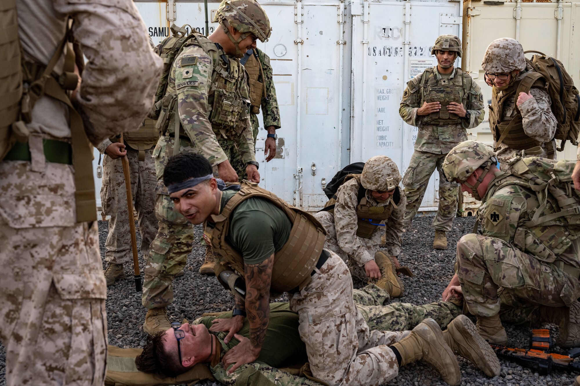 U.S. service members treat a simulated casualty for training.