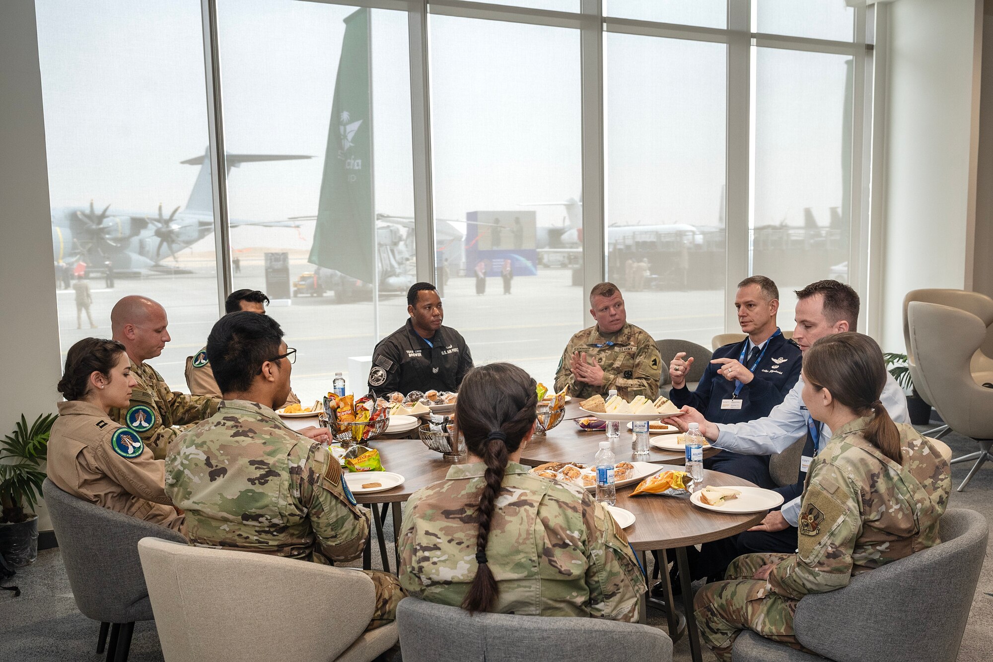 A group sits around a table for lunch.