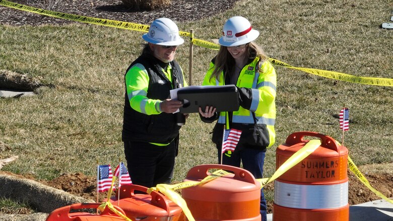 Civil Engineer Sarah Rhoton works with Valiant Construction Quality Control Manager William Mullins Feb. 5, 2024, on the Mountain Home National Cemetery Expansion Project for the Department of Veterans Affairs National Cemetery Administration in Johnson City, Tennessee. (USACE Photo)
