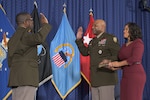 MG David Wilson administers the oath of office to Army Brig. Gen. Landis C. Maddox, DLA Troop Support commander, as his wife, Army Col. Yolonda Maddox watches on. Maddox was promoted to brigadier general during a ceremony at the Lieutenant General Andrew T. McNamara auditorium at Fort Belvoir, VA on January 26, 2024. Photo by Christopher Lynch, DLA Photographer