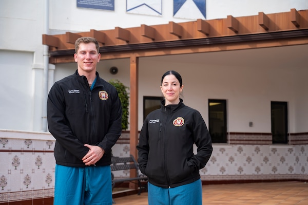 240205-N-NC885-1005 (NAVAL STATION ROTA, Spain)  Lt. Ryan Twaddle, a dentist at Navy Medical Readiness and Training Command (NMRTC) Rota, and Hospital Corpsman 3rd Class Rocio Jimenez Lopez, assigned to the dental department, pose for a photo in the hospital couryard, Feb. 5, 2024.  Twaddle and Jimenez Lopez have been instrumental in organizing an ongoing community relations program with a local association.  (U.S. Navy photo by Mass Communication Specialist 2nd Class Drace Wilson)