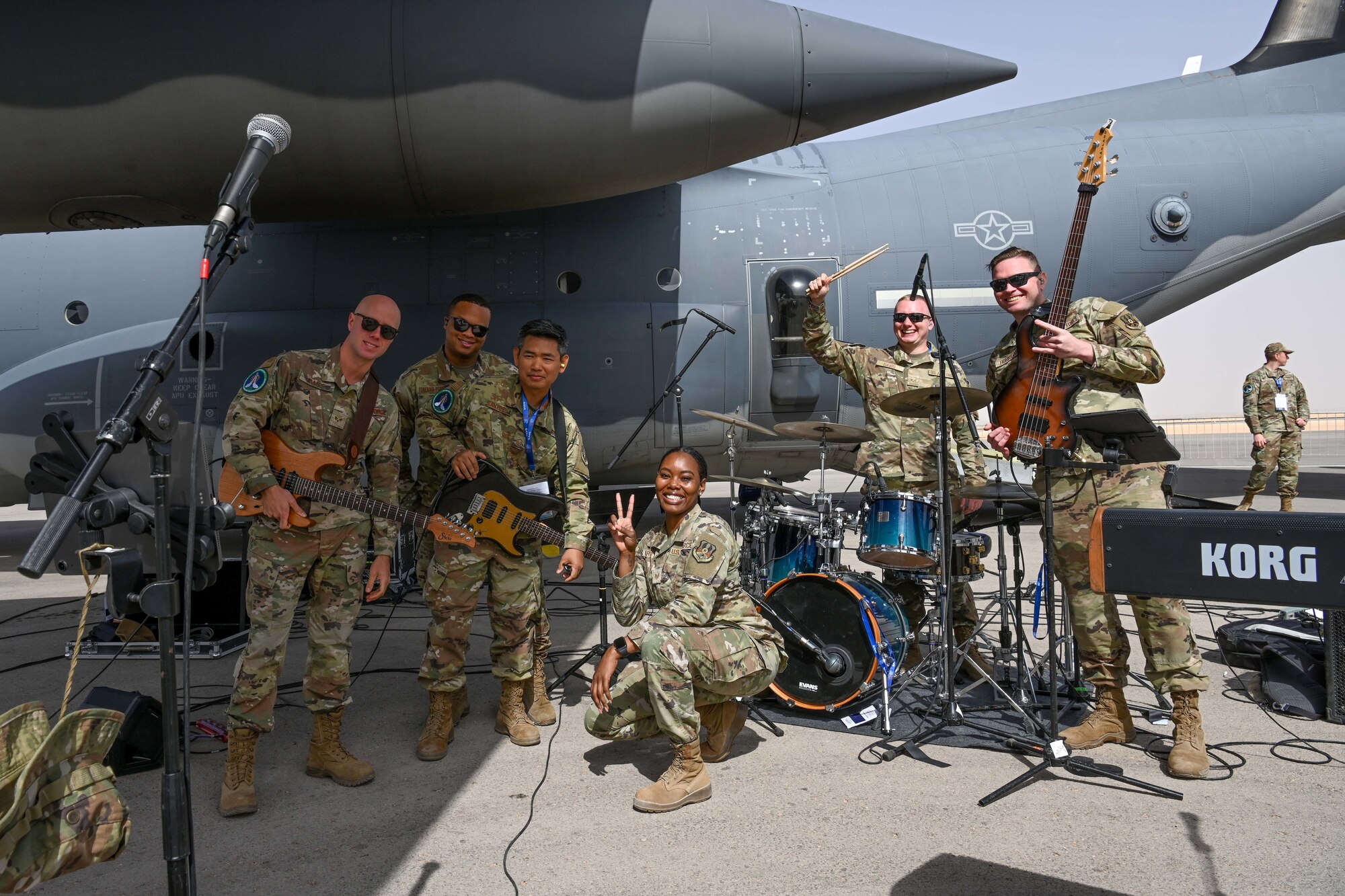 U.S. Air Force personnel assigned to the Air Forces Central Band pose for a photo during the Saudi World Defense Show at an undisclosed location in the Central Command area of responsibility, Feb. 4, 2024. U.S. military participation in the Saudi World Defense Show allows foreign military and civilian decision-makers an opportunity to evaluate and compare U.S. Air Force aircraft in a non-operational and threat-free environment.  (U.S. Air Force courtesy photo)