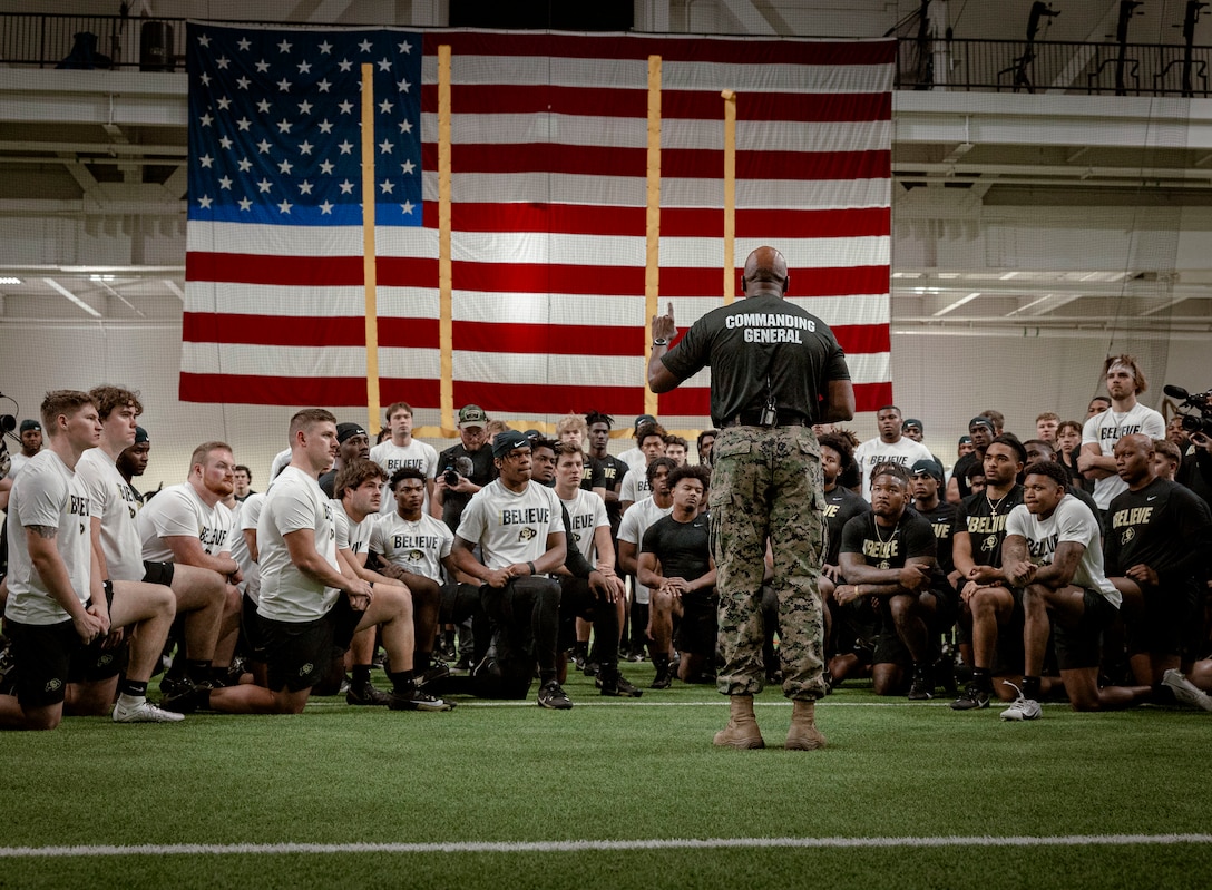 U.S. Marine Corps Brig. Gen. James A. Ryans, commanding general of Marine Corps Recruit Depot San Diego and Western Recruiting Region, speaks to the University of Colorado - Boulder (CU-B) football athletes and prepares them for an upcoming workout in Boulder, Colo. on January 24, 2024. This workout was hosted by the Marines with Recruiting Station (RS) Denver in collaboration with the CU-B Naval Reserve Officer Training Corps (NROTC) program. The purpose of this event was to enhance the Marines’ relationship with the CU-B athletics program and inform the athletes about leadership and fitness opportunities in the Marine Corps. (U.S. Marine Corps photo by Sgt. Lydia Gordon)