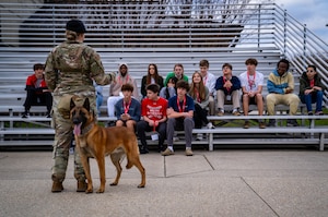 U.S. Air Force Staff Sgt. Ryan Wood, 81st Security Forces Squadron military working dog kennel master, speaks to students in the Biloxi Chamber of Commerce Junior Leadership program at Keesler Air Force Base, Mississippi, Feb. 5, 2024.