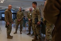 U.S. Air Force Lt. Gen. Robert Miller, Air Force Surgeon General, speaks to members of the 5th Medical Group during an All-Call at Minot Air Force Base, North Dakota, Feb. 5, 2024. As the Surgeon General for the United States Air Force, Miller advises the Secretary of the Air Force, the Air Force Chief of Staff, the Space Force Chief of Space Operations and the Assistant Secretary of Defense for Health Affairs on matters pertaining to the medical aspects of the air expeditionary force and the health of Airmen and Guardians. (U.S. Air Force Photo by Airman 1st Class Luis Gomez)