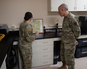 U.S. Air Force Lt. Gen. Robert Miller, Air Force Surgeon General, speaks to members of the 5th Medical Group during an All-Call at Minot Air Force Base, North Dakota, Feb. 5, 2024. As the Surgeon General for the United States Air Force, Miller advises the Secretary of the Air Force, the Air Force Chief of Staff, the Space Force Chief of Space Operations and the Assistant Secretary of Defense for Health Affairs on matters pertaining to the medical aspects of the air expeditionary force and the health of Airmen and Guardians. (U.S. Air Force Photo by Airman 1st Class Luis Gomez)