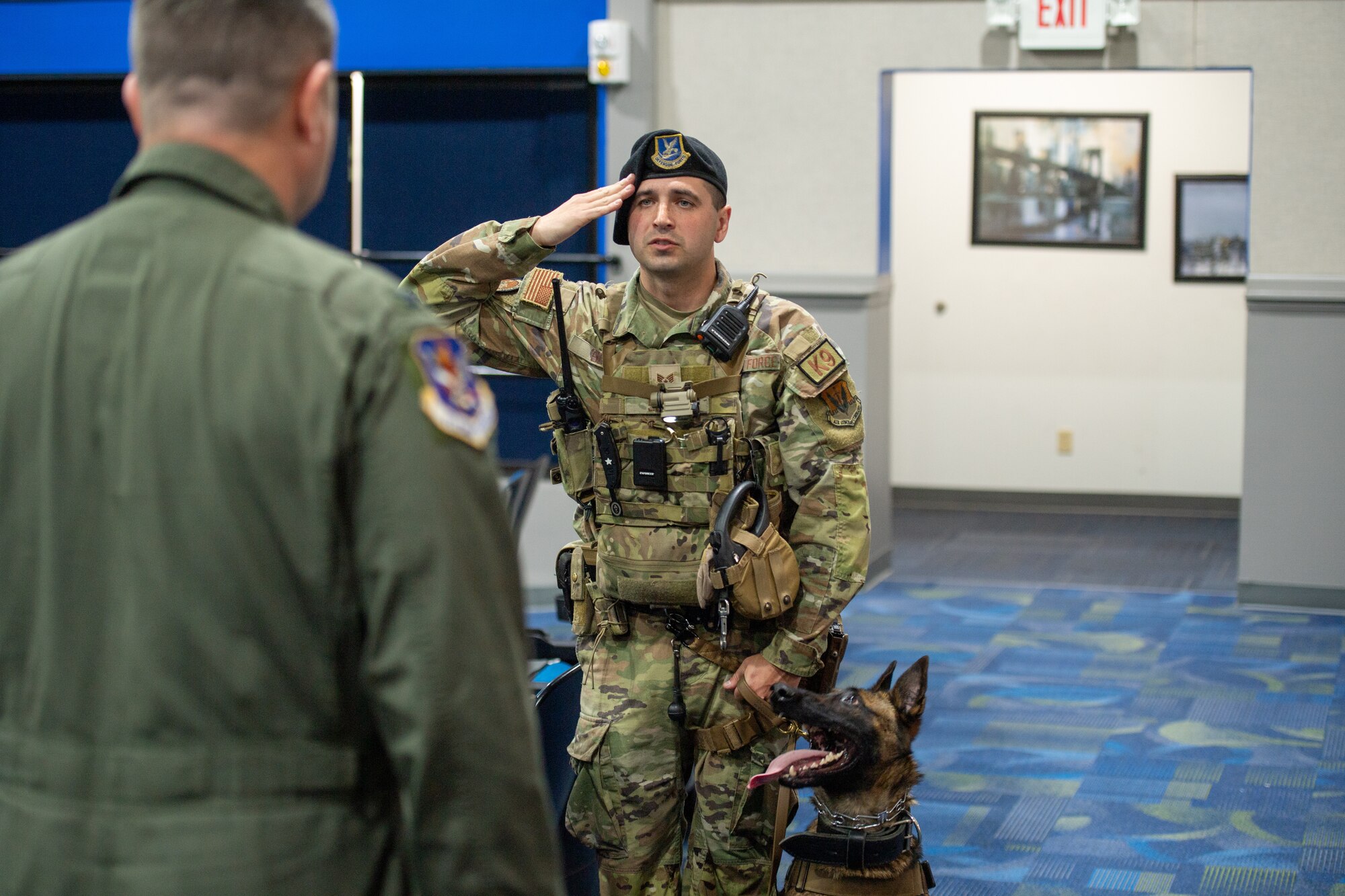 K-9 handler salutes officer