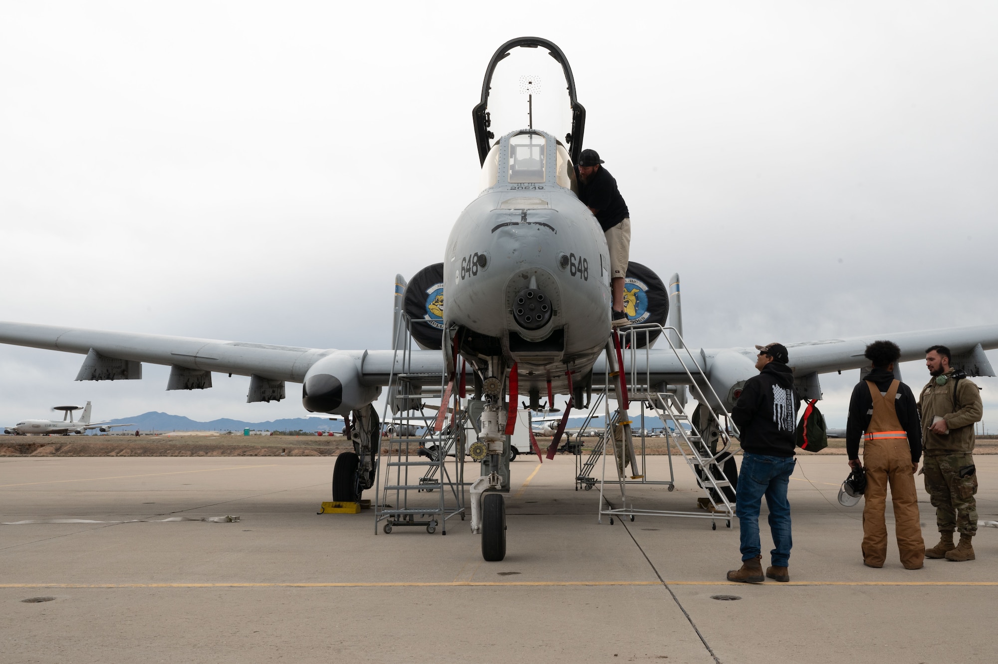 An A-10C Thunderbolt II aircraft is examined on at Davis-Monthan Air Force Base, Ariz., Feb. 6, 2024. The A-10C model featured a .30mm GAU-8/A rotary cannon protruding from the nose. (U.S. Air Force photo by Airman 1st Class Robert Allen Cooke III)