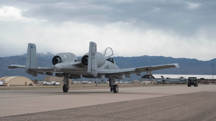 An A-10C Thunderbolt II, aircraft taxis towards the 309th Aircraft Maintenance and Regeneration Group at Davis-Monthan Air Force Base, Ariz., Feb. 6, 2024.  All of DM's A-10s will be stored in the AMARG as the Air Force retires the aircraft. (U.S. Air Force photo by Staff Sgt. Nicholas Ross)