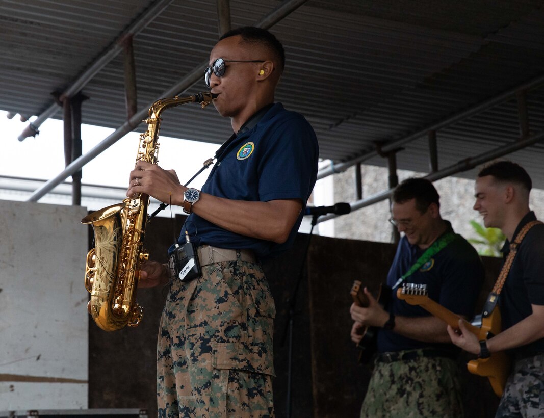 SUVA, Fiji (Nov. 3, 2023) – U.S. Marine Corps Lance Cpl. Kwame Dinizulu plays a saxophone solo during a Pacific Partnership 2023 Band performance at the Civic Center Peace Garden, Nov. 3. Now in its 18th year, Pacific Partnership is the largest annual multinational humanitarian assistance and disaster relief preparedness mission conducted in the Indo-Pacific. (U.S. Navy photo by Mass Communication Specialist 2nd Class Deirdre Marsac)
