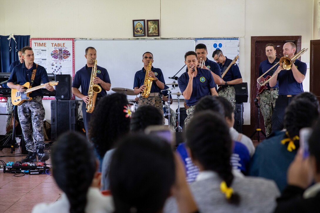 NUKU'ALOFA, Tonga (Nov. 14, 2023) – Pacific Partnership 2023 Band performs at St. Joseph Business College, Nov. 14. Now in its 18th year, Pacific Partnership is the largest annual multinational humanitarian assistance and disaster relief preparedness mission conducted in the Indo-Pacific. (U.S. Navy photo by Mass Communication Specialist 2nd Class Deirdre Marsac)