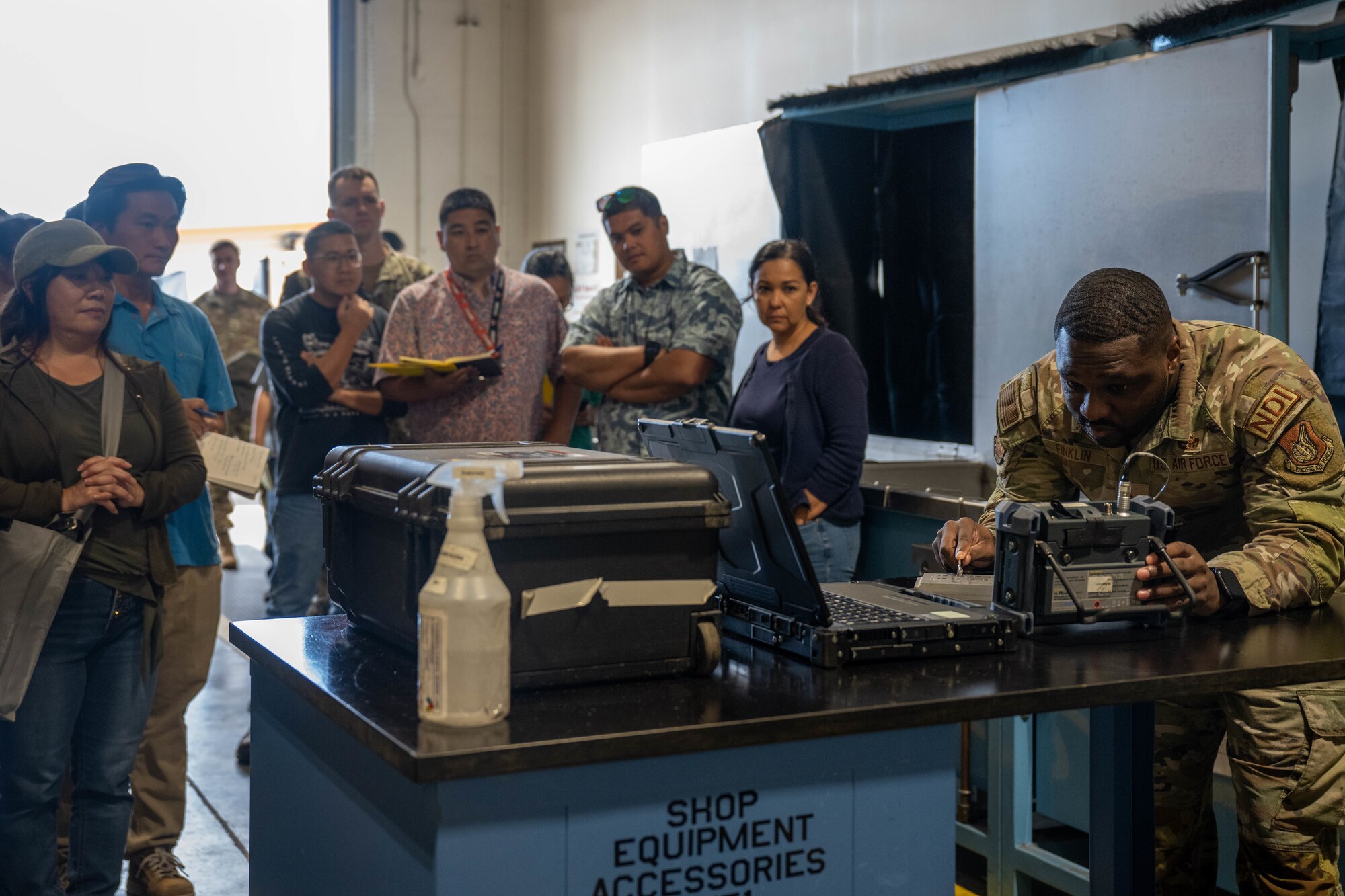 Photo of Airmen briefing.