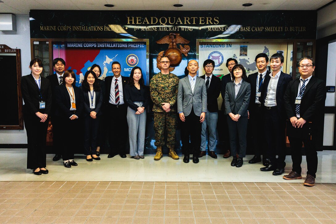 U.S. Marine Corps Col. Fred Ingo, Assistant Chief of Staff, G-7 Government and External Affairs, Marine Corps Installations Pacific, G-7 staff, and municipality representatives from Kanagawa Prefecture pose for a group photo after a discussion about the III Marine Expeditionary Force and its role in the U.S. Indo-Pacific Command on Camp Foster, Okinawa, Japan, Feb. 1, 2024. The visit emphasized the base's role in international cooperation, regional security, and the significance of the U.S.-Japan alliance in preserving peace in the Indo-Pacific region. (U.S. Marine Corps photo by Cpl. Jonathan A. Beauchamp)