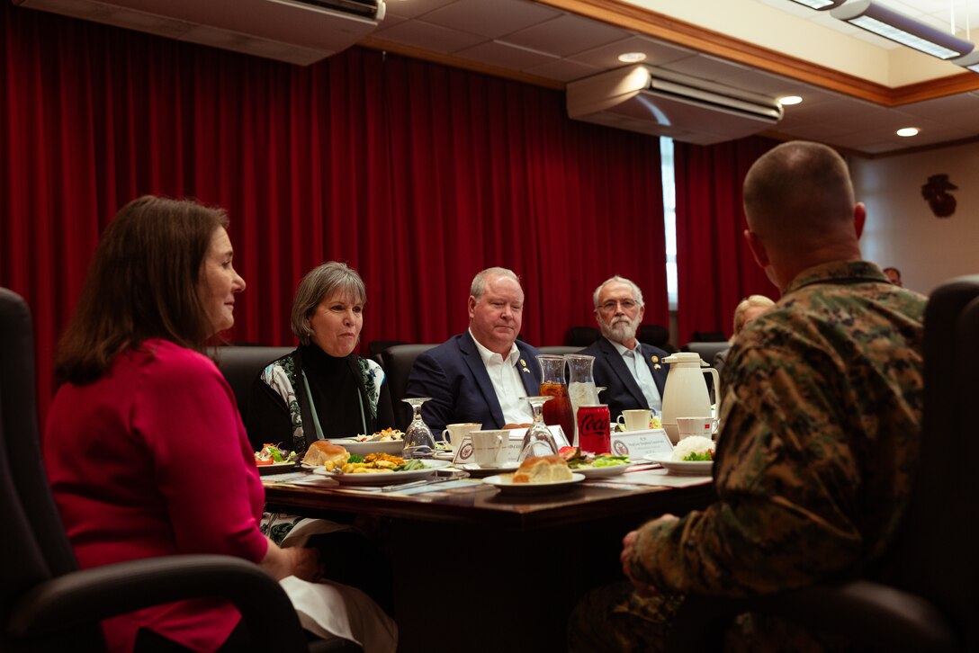 U.S. Marines and representatives with the Former Members of Congress Congressional Study Group discuss the importance of Marines being stationed in Okinawa, on Marine Corps Air Station Futenma, Okinawa, Japan, Jan. 26, 2024. The FMC Congressional Study Group and Sasakawa Peace Foundation hold an annual tour to learn more about the force capabilities of Marines stationed in the Indo-Pacific. (U.S. Marine Corps photo by Cpl. Vincent Pham)