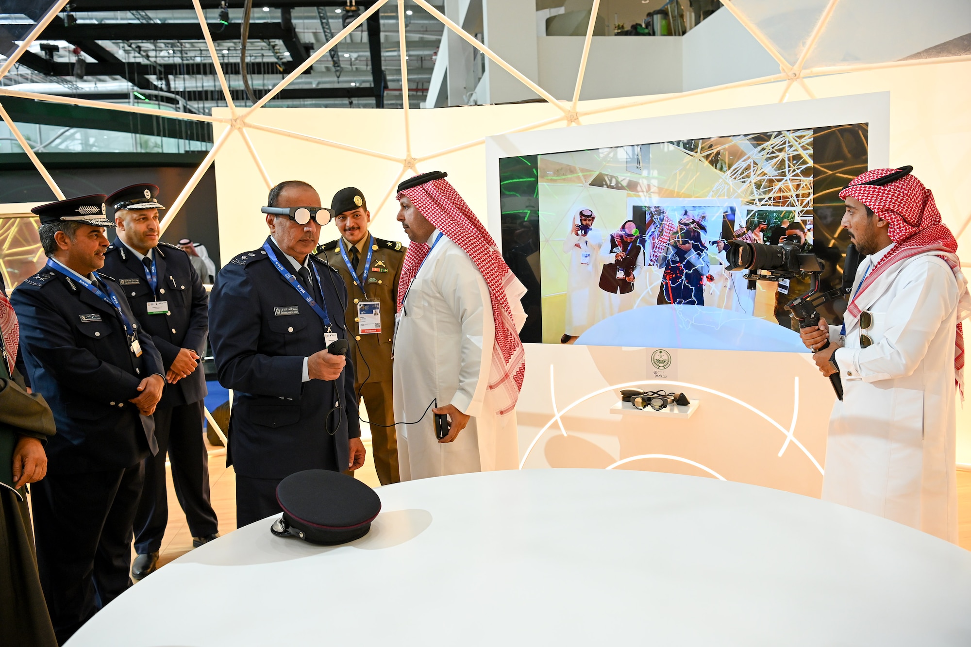 Personnel assigned to the Bahraini Ministry of Defense experience a virtual reality demonstration during the World Defense Show at an undisclosed location in the Central Command area of responsibility, Feb. 4, 2024. The U.S.’s regional partners operating throughout U.S. Central Command’s area of responsibility focuses on building lasting relationships through political, diplomatic, economic, and military channels to advance regional alliances and collective capabilities.(U.S. Air Force courtesy photo)