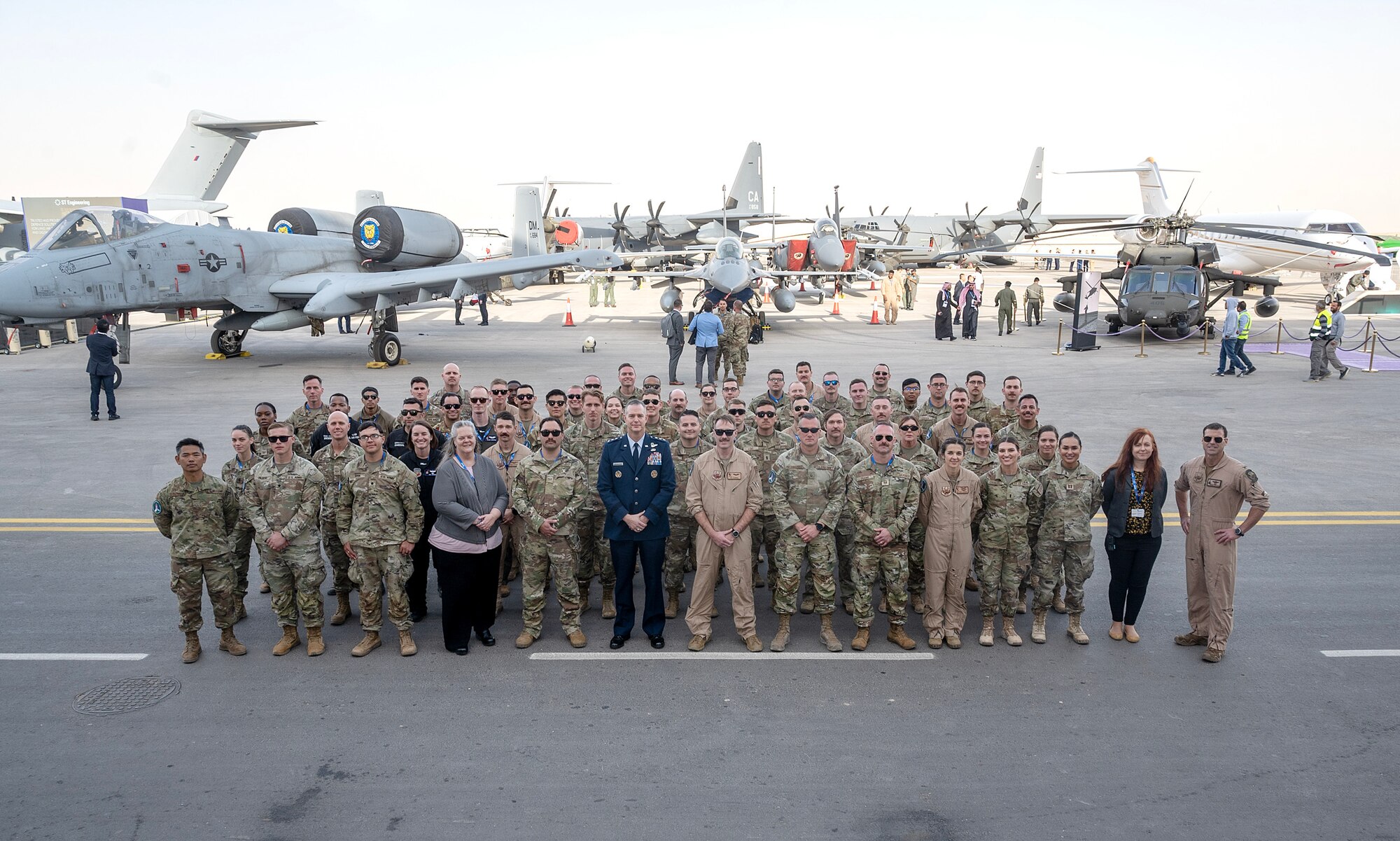 A group poses for a group photo.