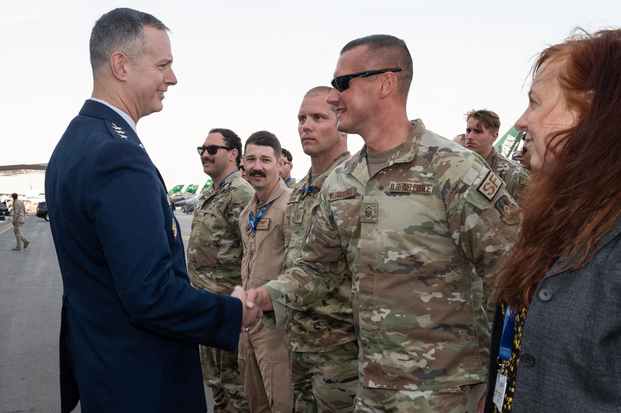 Men shake hands.