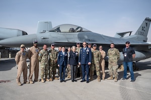 A group poses for a group photo.