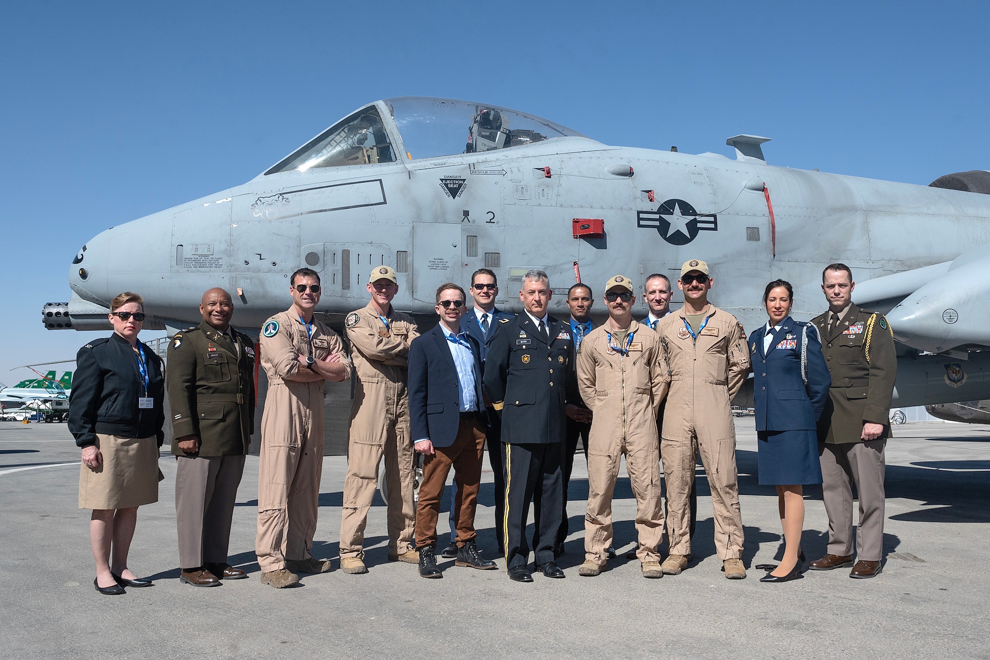 A group poses for a group photo.
