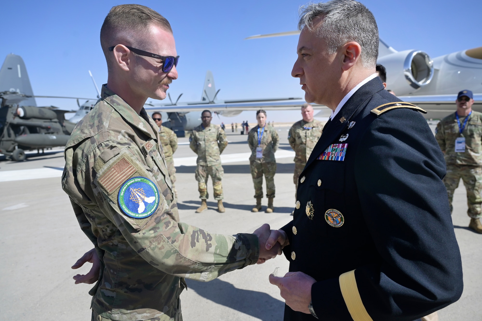 Men shake hands.