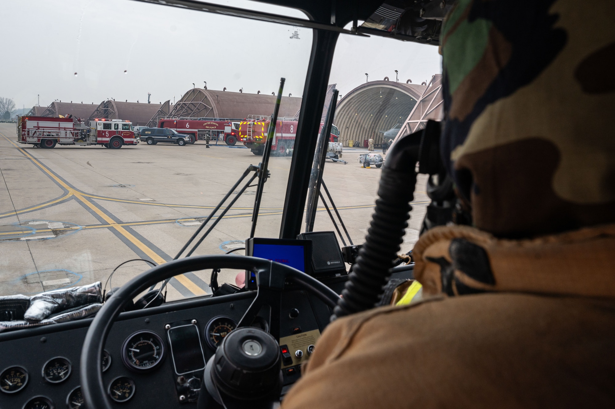 U.S. Air Force Airman 1st Class Luc Stackpoole, 51st Civil Engineer Squadron firefighter, responds to a simulated flight line emergency at Osan Air Base, Republic of Korea, Feb. 1, 2024. Firefighters at Osan participate in regular training and are thoroughly evaluated to ensure that they will be prepared in the event of a real-world threat. (U.S. Air Force photo by Airman 1st Class Chase Verzaal)