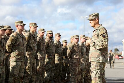 Army Gen. Daniel Hokanson, chief, National Guard Bureau, meets with Arkansas Guardsmen assigned to Task Force Bowie, 39th Infantry Brigade Combat Team, on rotation overseeing the training taking place with the Joint Multinational Training Group-Ukraine, Grafenwoehr, Germany, Oct. 21, 2023.