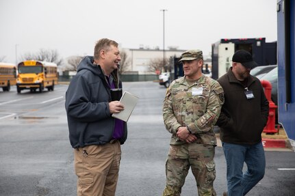 Oklahoma Army National Guardsman Maj. Aaron Dougherty, deputy commander for the 63rd Civil Support Team, talks with members of emergency response agencies at the inaugural Domestic Operations Symposium at the Armed Forces Reserve Center in Norman, Oklahoma, Jan. 23, 2024. More than 20 emergency response agencies from across the state gathered for the event to build a shared understanding of roles and responsibilities, encourage collaborative planning, mutual aid, and participation in upcoming training events. (Oklahoma National Guard photo by Staff Sgt. Reece Heck)