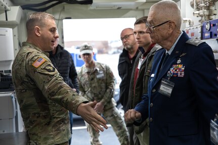 Oklahoma Army National Guardsman Capt. John Schatz, a nuclear medical officer with the 63rd Civil Support Team, talks with members from emergency response agencies at the inaugural Domestic Operations Symposium at the Armed Forces Reserve Center in Norman, Oklahoma, Jan. 23, 2024. More than 20 emergency response agencies from across the state gathered for the event to build a shared understanding of roles and responsibilities, encourage collaborative planning, mutual aid, and participation in upcoming training events. (Oklahoma National Guard photo by Staff Sgt. Reece Heck)