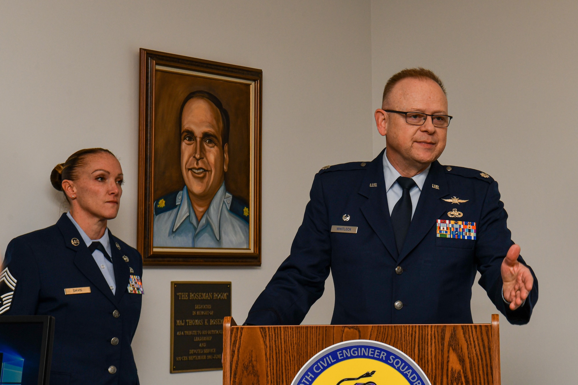 Lt. Col. Russell Whitlock, 910th Mission Support Group commander, introduces Maj. Mark Harris as the incoming commander of the 910th Civil Engineer Squadron during an assumption of command ceremony on Feb. 3, 2024, at Youngstown Air Reserve Station, Ohio.