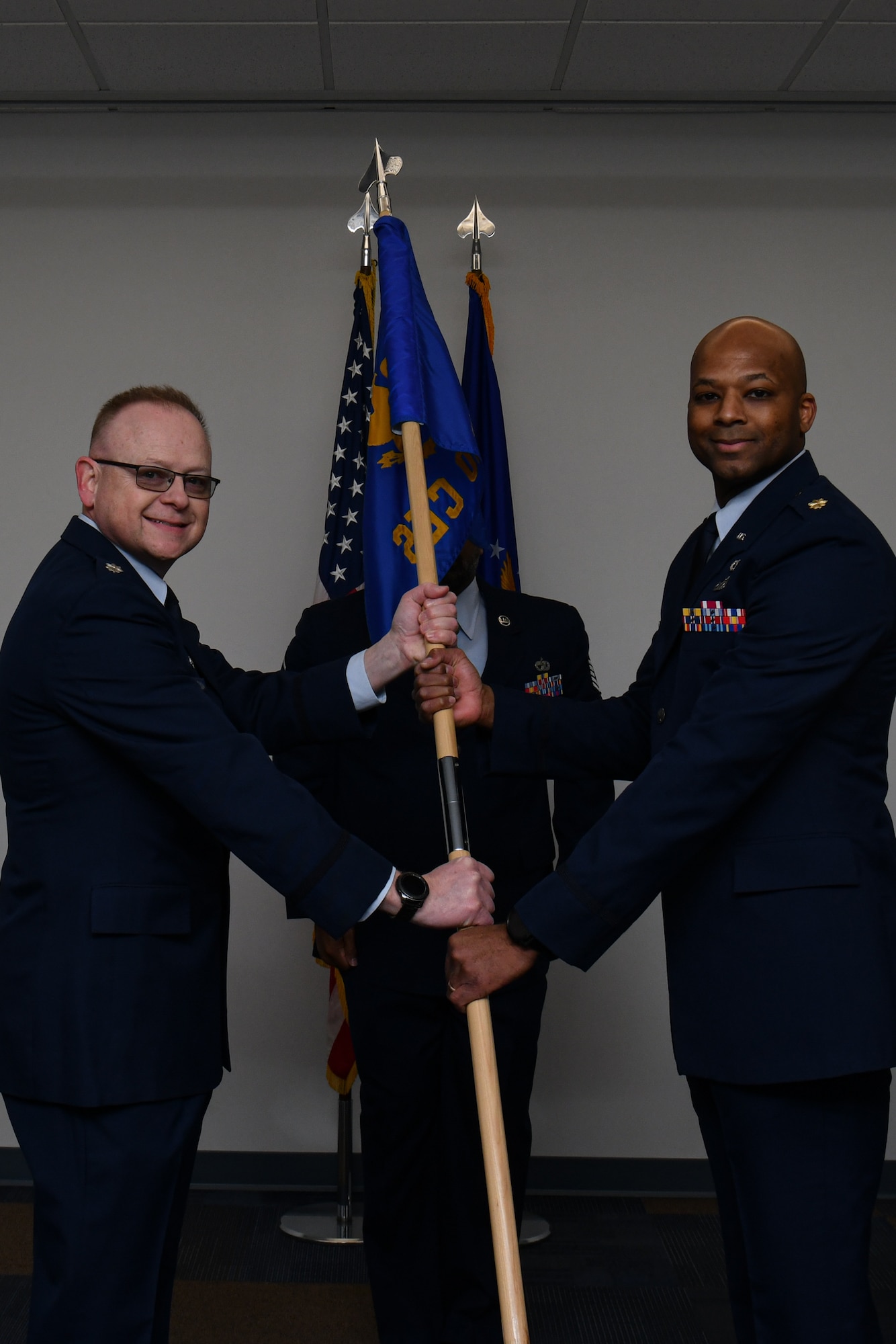 Lt. Col. Russell Whitlock, 910th Mission Support Group commander, transfers command of the 910th Civil Engineer Squadron to Maj. Mark Harris on Feb. 3, 2024, at Youngstown Air Reserve Station, Ohio.
