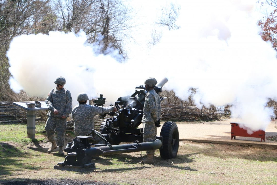 Virginia National Guard field artillery Soldiers explain the capabilities of the M119A2 howitzer, answer questions about the Guard and take part in a demonstration of 400 years of Virginia artillery during the Military Through the Ages event March 21, 2015, at Jamestown Settlement in Williamsburg, Va.