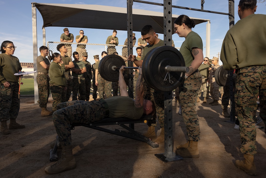 U.S. Marine Corps Sgt. Joshua Somero, electronic intelligence analyst, Marine Aviation Weapons and Tactics Squadron One, bench presses 185 lbs during the annual Super Squadron competition at Marine Corps Air Station Yuma, Arizona, Jan. 26, 2024. The Super Squadron was a friendly competition between various units on the air station, designed to help strengthen teamwork as well as boost station morale. (U.S. Marine Corps photo by Lance Cpl. Elizabeth Gallagher)
