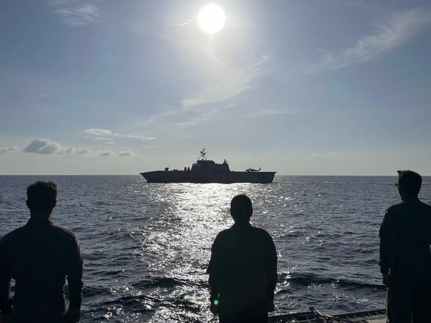 Armed Forces of the Philippines Sailors assigned to Philippine Navy’s BRP Gregorio Del Pilar (PS-15) look on as Independence-variant littoral combat ship USS Gabrielle Giffords (LCS 10) sails alongside during a maritime cooperate activity exercise in the South China Sea Feb. 9.