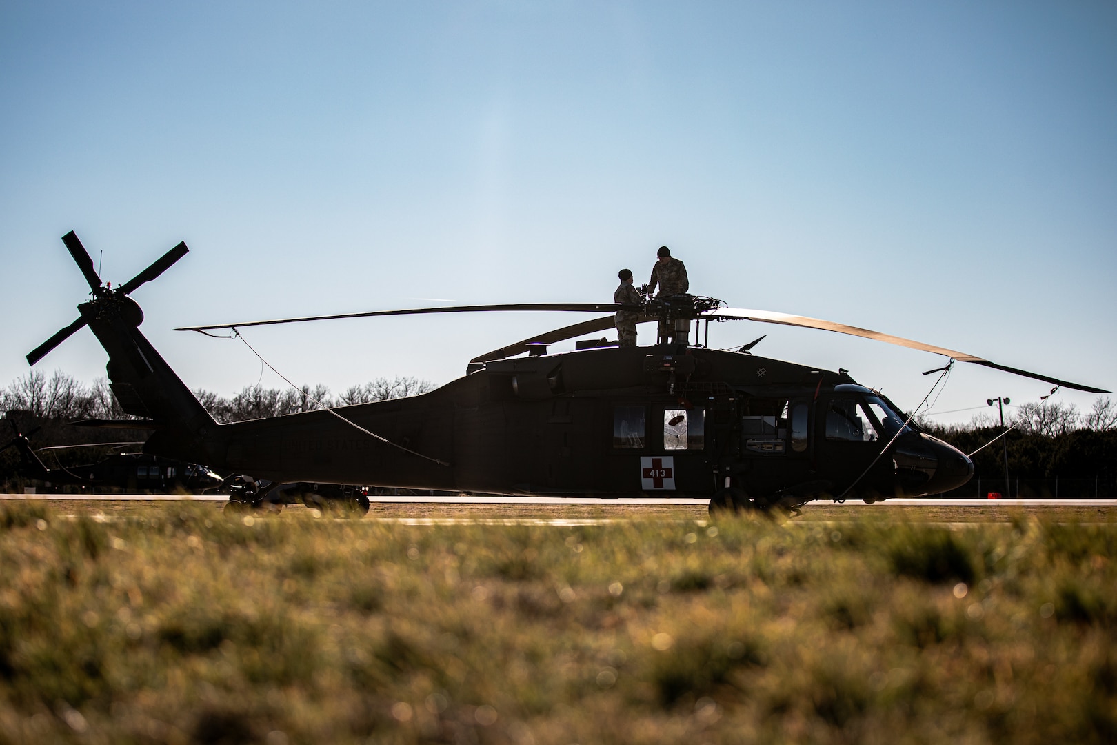 Soldiers with Charlie Company, 1st Battalion (Assault Helicopter Battalion), 244th Aviation Regiment, 90th Troop Command, Oklahoma Army National Guard perform maintenance on a UH-60 Black Hawk helicopter at Fort Cavazos, Texas, Jan. 9, 2024. The 244th AHB underwent rigorous pre-mobilization training in preparation for their upcoming deployment to Kosovo in support of Operation Joint Guardian. (Oklahoma National Guard photo by Cpl. Danielle Rayon)