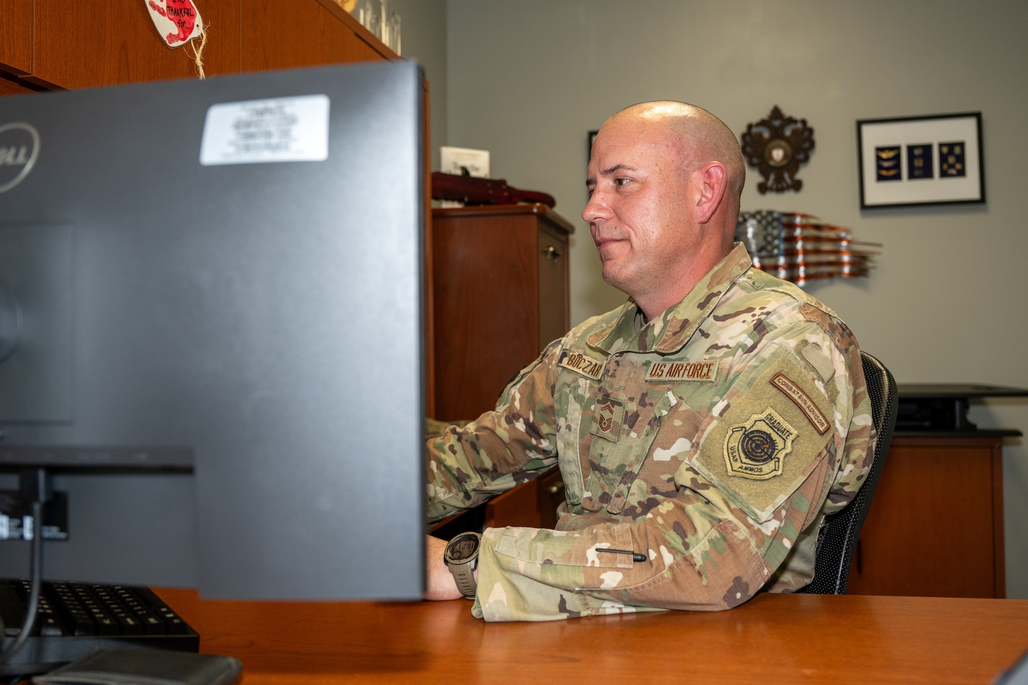 U.S. Air Force Senior Master Sgt. Stephan Boczar, 1st Special Operations Maintenance Squadron aircraft maintenance division chief, performs routine operational duties at Hurlburt Field, Florida, Feb. 1, 2024. Boczar won the 2023 Air Force Special Operations Command Lance P. Sijan U.S. Air Force Leadership Award. The honor highlights individuals who have exhibited the utmost qualities of leadership both in their professional roles and personal lives.  (U.S. Air Force photo by Senior Airman Alysa Calvarese)