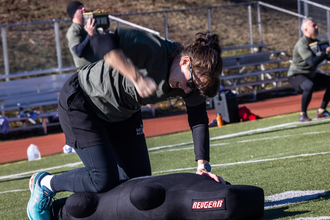 Ruth Kroona, an Alaska native and Federal Bureau of Investigation counselor, participates in an annual joint physical training and morale building event at Butler Stadium on Marine Corps Base Quantico, Virginia, Feb. 7, 2024. The FBI National Academy is a program that trains active U.S. and international law enforcement personnel. The event is an annual requirement for students and serves to strengthen the FBI and Marine Corps bond. (U.S. Marine Corps photo by Lance Cpl. Joaquin Dela Torre)