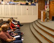 Maj. Gen. Rodney Boyd, Assistant Adjutant General – Army, and commander of the Illinois Army National Guard, thanks the family of Col. Jason Carter during Carter’s promotion ceremony at the Illinois National Guard’s Military Academy in Springfield, Illinois.