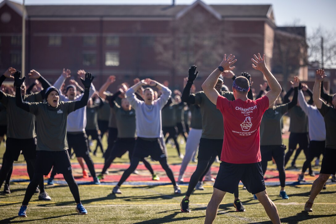 U.S. Marines with the Wounded Warrior Regiment and students with the Federal Bureau of Investigation National Academy participate in an annual joint physical training and morale building event at Butler Stadium on Marine Corps Base Quantico, Virginia, Feb. 7, 2024. The FBI National Academy is a program that trains active U.S. and international law enforcement personnel. The event is an annual requirement for students and serves to strengthen the FBI and Marine Corps bond. (U.S. Marine Corps photo by Lance Cpl. Joaquin Dela Torre)