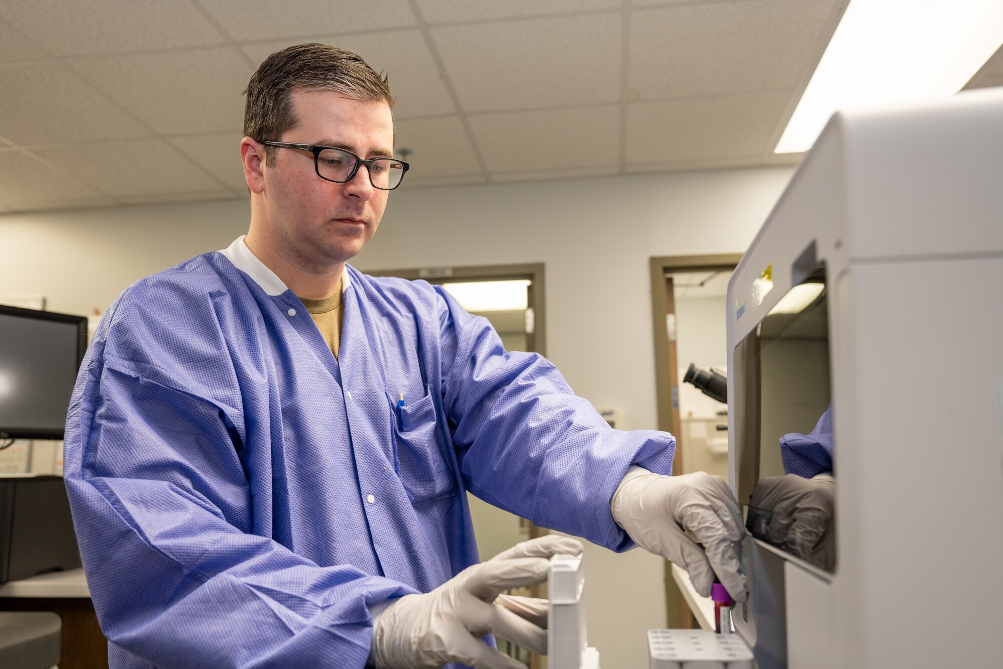 U.S. Air Force Staff Sgt. Brandon Rickard, 1st Special Operations Medical Group non-commissioned officer in charge of laboratory shipping, performs a hematology test at Hurlburt Field, Florida, Feb. 7, 2024. Laboratory technicians are responsible for receiving, testing, analyzing, recording and reporting results of their tests to ensure Air Commandos are taken care of and ready to perform mission essential duties at a moment’s notice. (U.S. Air Force photo by Senior Airman Alysa Calvarese)