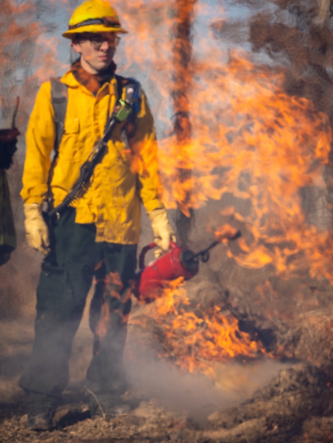 Brehm Corbin, a firefighter with Quantico Fire and Emergency Services, conducts a controlled burn on Marine Corps Base Quantico, Virginia, Feb. 6, 2024. The purpose of the burns is to reduce fuel litter, minimize the potential of wildfires, and promote wildlife habitat. (U.S. Marine Corps photo by Lance Cpl. Joaquin Dela Torre)