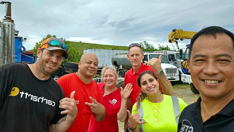 Personnel from the U.S. Army Corps of Engineers, Savannah District, Emergency Power Planning and Response Team, are shown with the contractor and the local point of contact during a mission in Saipan. The team is one of seven Emergency PRTs operated nationwide by the Corps, equipped with the capability to deploy, and provide a spectrum of support.