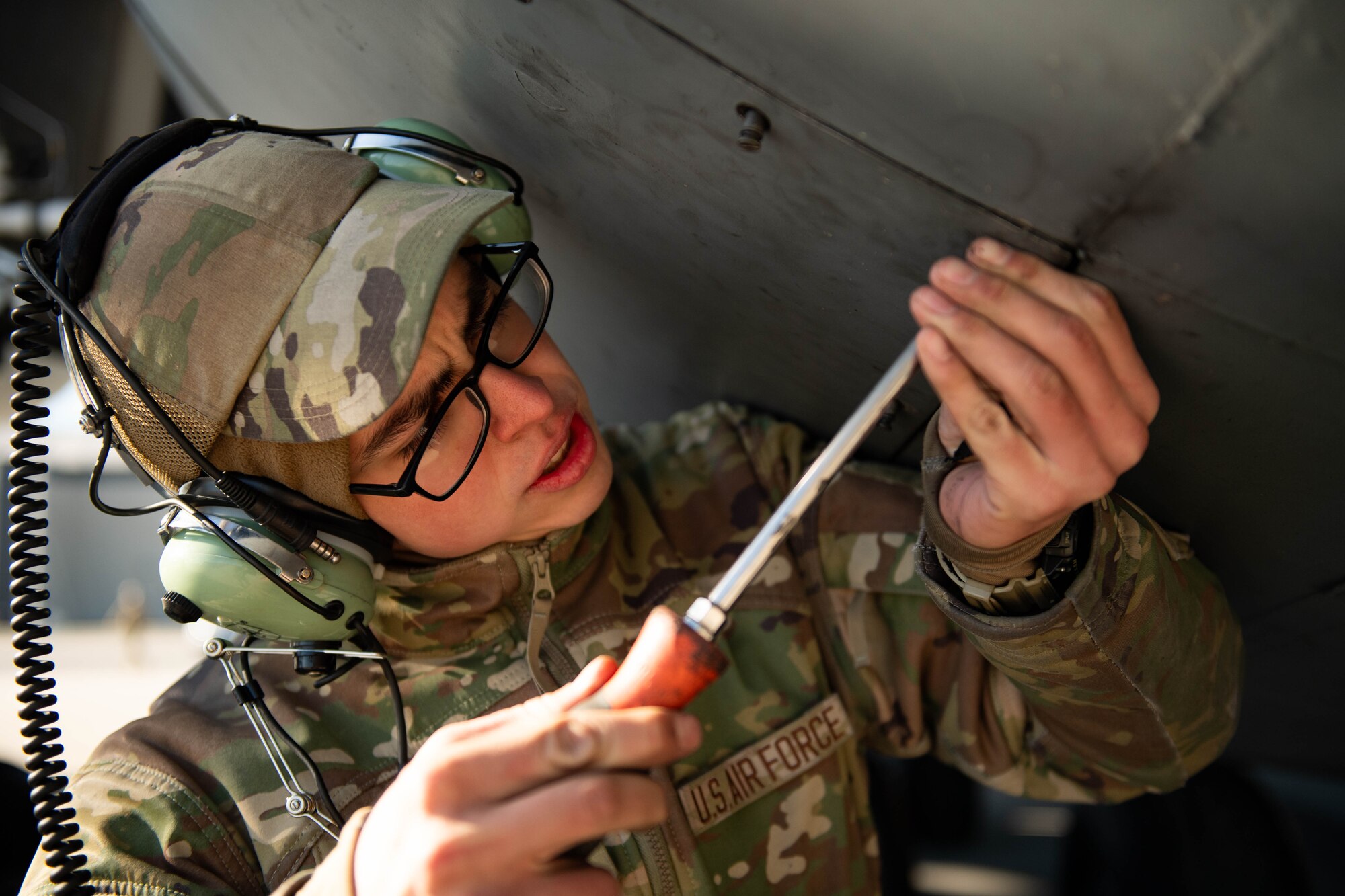 U.S. Air Force Airman 1st Class Pablo Corona, 436th Aircraft Maintenance Squadron crew chief, tightens a screw on a C-5M Super Galaxy at Dover Air Force Base, Delaware, Feb. 7, 2024. The C-5M Super Galaxy was delivered to Westover Air Reserve Base, Massachusetts for an isochronal maintenance inspection. (U.S. Air Force photo by Tech. Sgt. J.D. Strong II)