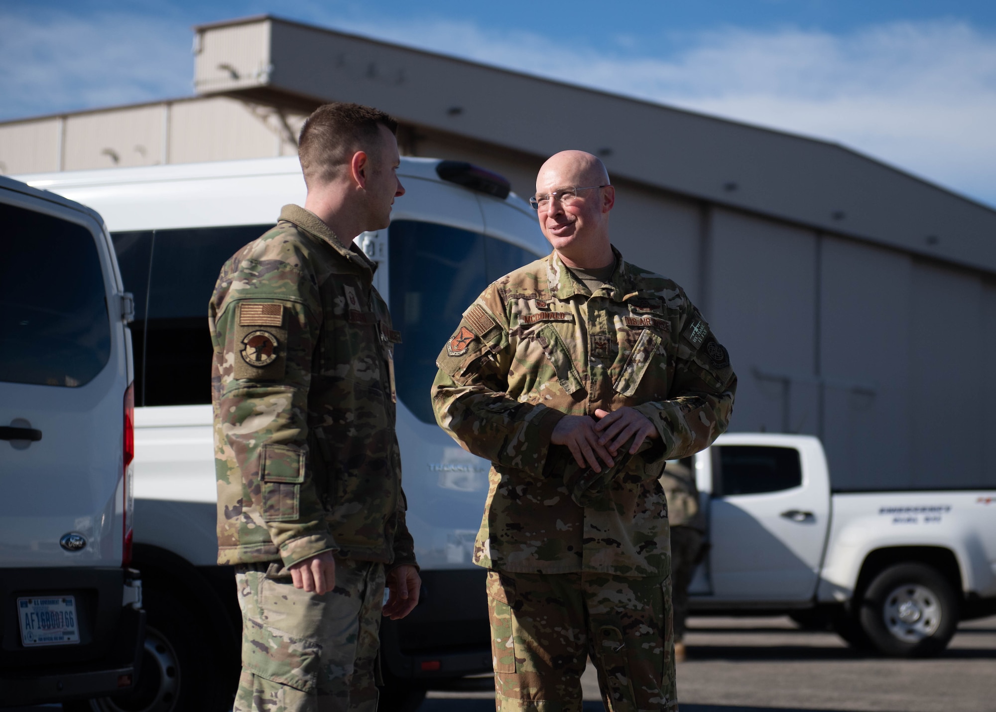 U.S. Air Force Col. Chris McDonald, 436th Airlift Wing commander, converses with U.S. Air Force Master Sgt. Konrad Jazwierski, 436th Maintenance Squadron detachment flight chief at Westover Air Reserve Base, Massachusetts, Feb. 7, 2024. During the visit, McDonald toured the C-5M Isochronal Maintenance Dock and conducted an all-call to members of the 436th Maintenance Squadron, Operating Location Alpha, a tenant unit of the 436th AW. (U.S. Air Force photo by Tech. Sgt. J.D. Strong II)